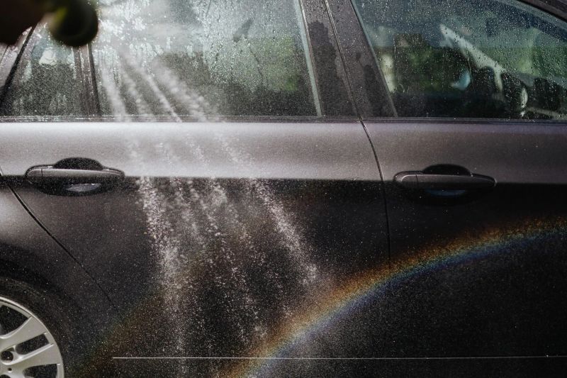 Carter’s Wash Pro’s technician carefully pressure washing a residential property in Locust, NC