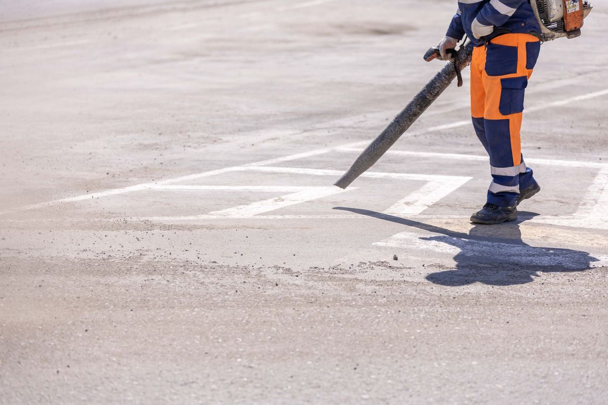 Carter’s Wash Pro’s cleaning a Midland North Carolina driveway with a pressure washer