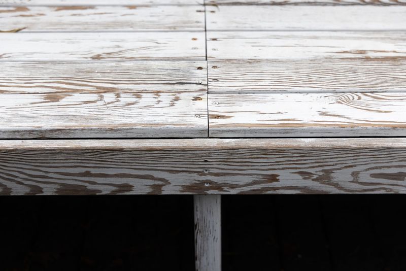Freshly cleaned backyard deck with outdoor seating